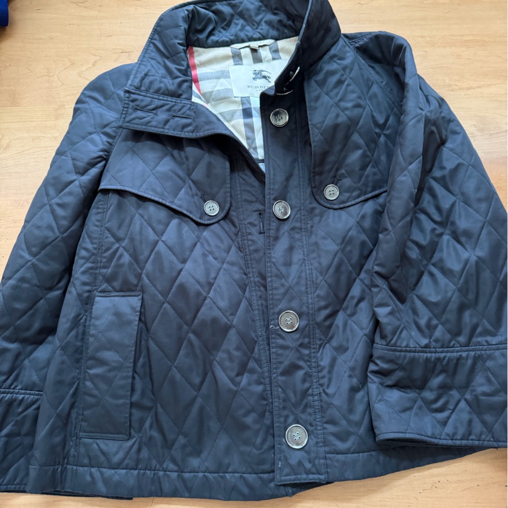 Women’s Burberry Quilted Cape style Jacket - Black
Classy, elegant